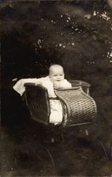 Baby in wicker carriage Babies Postcard Postcard