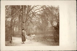 Woman with a Child in a Pram on a Country Lane Postcard