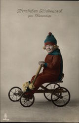 Child in Winter Clothes on a Bike Children Postcard Postcard