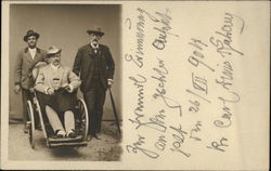 3 men in hats, one in wheelchair Postcard Postcard