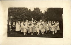 Group of Girls in White holding American Flags Postcard