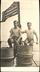 Two Men on a Boat with a USA Flag Flags Postcard Postcard