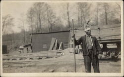 Man with Staff and Feather Headdress Postcard