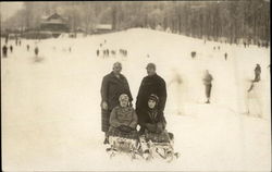 Family Sledding on Snow Hill Postcard