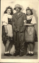 A Soldier and 2 Women Postcard