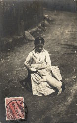 Little Girl Kneeling in the Dirt while Bottle-feeding a Piglette Pigs Postcard Postcard