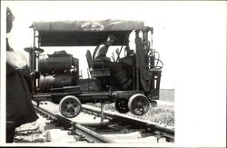 Train Car on a lift Postcard