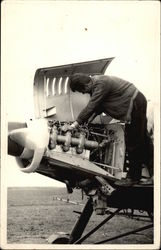 Mechanic working on Aircraft Engine Postcard