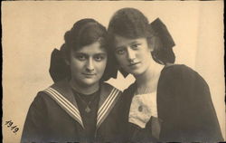 Two Young Ladies wih bows in their Hair Women Postcard Postcard