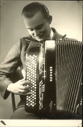 Vintage Photograph of Seated Man playing an Accoridan Music Postcard Postcard