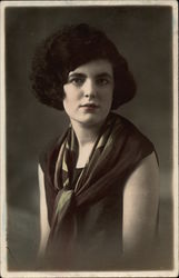 Woman with black short hair & brown scarf Postcard