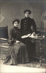 Two Women at a Desk Postcard