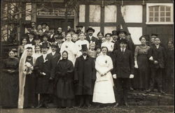 A Bride and Groom with Guests Postcard