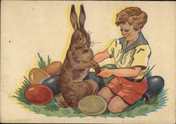 Little Boy in Red Shorts Holding Bunny's Paw Surrounded by Colored Easter Eggs With Bunnies Postcard Postcard