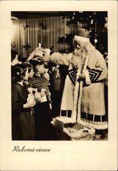 Santa Claus Handing Out Gifts to Children Postcard Postcard