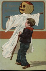 Boy Carrying Jack O' Lantern / Ghost Halloween Postcard Postcard