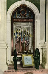 Gettysburg gun and battle flages, State House Postcard