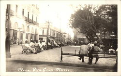 Men Sitting on Benches in the Plaza Vera Cruz, Mexico Postcard Postcard