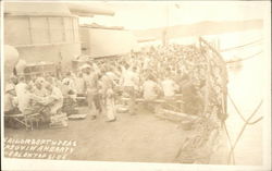 U.S.S. Texas - Sailors Enjoying a Hearty Meal Topside Postcard