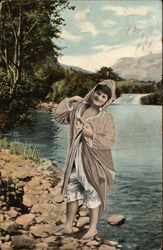 Woman on side of lake with robe on Postcard