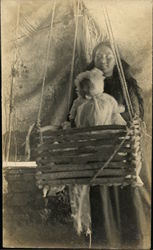 Native American Woman with Baby in a Cradle Postcard