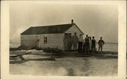 Men Outside House - Frontier Postcard Postcard