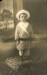 Young Child Standing on a Chair Postcard