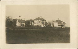 View of Several White Buildings Postcard