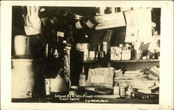 Interior of a Well-Filled Claim Shack Postcard