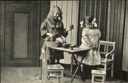 Girl offering another girl an apple Postcard