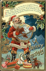 Santa holding a globe with toys around his feet Santa Claus Postcard Postcard