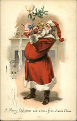 A Merry Christmas and a kiss from Santa Claus Postcard Postcard