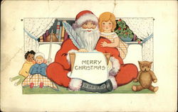 Santa Writing List Surrounded by Toys Postcard