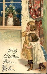 Two girls looking at Santa through window Postcard