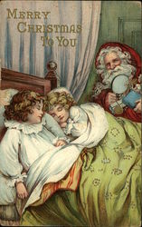 Merry Christmas to You with Children Sleeping and Santa Postcard