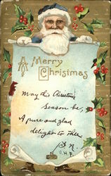 Santa in blue suit and hat holding a Christmas message Postcard