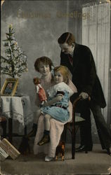 Christmas Greetings with Father, Mother and Little Girl Postcard