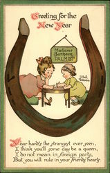 Two Playing at Palm Reading, Framed by Horseshoe Postcard