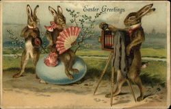 Rabbit Takes Photograph Of Rabbit Couple Posing Near Egg With Bunnies Postcard Postcard