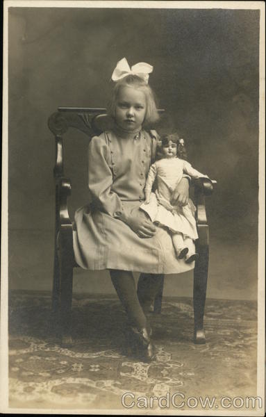 doll sitting in chair
