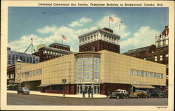 Overland Greyhound Bus Station, Telephone Building in Background Postcard