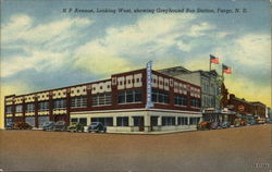 N P Avenue Looking West showing Greyhound Bus Station Postcard