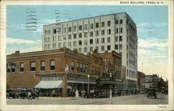 Street View of Black Building Postcard