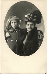 Two women in winter clothing Postcard