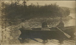 People in row boat, two women + 1 man rowing Canoes & Rowboats Postcard Postcard