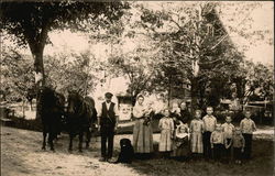 Portrait of Family In Front of Home Postcard