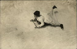 Woman Sledding on Ice Postcard