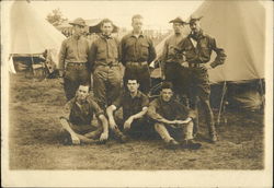 Military Men in front of Tents, 5 standing, 3 sittiing, Pine Camp Fort Drum, NY Postcard Postcard