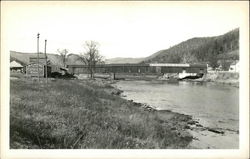 Scene of water & covered bridge - Ceresota Flour sign Postcard