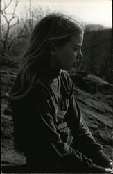 Girl facing right, looking pensive Postcard